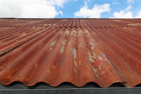 rust sheet metal roof|rusty metal roof refinishing.